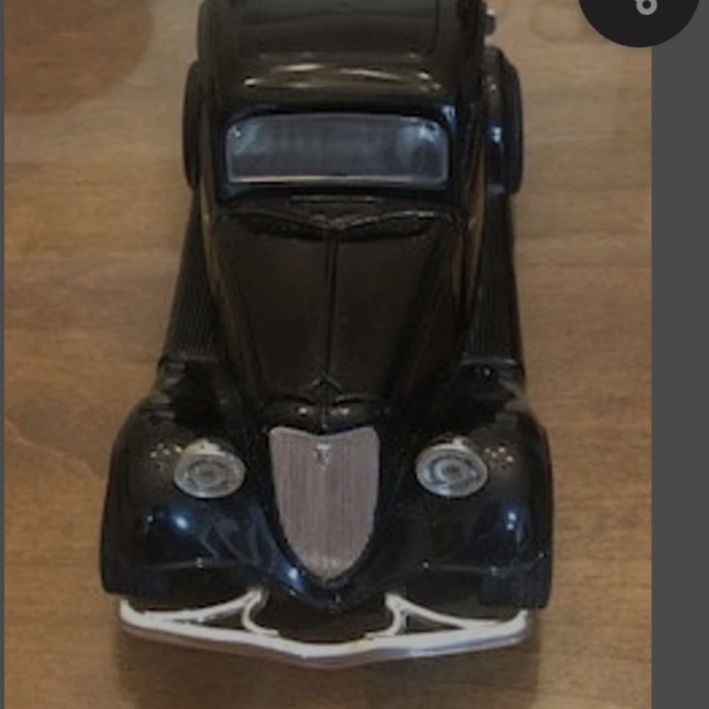 Classic Black Model Car with Silver Accents